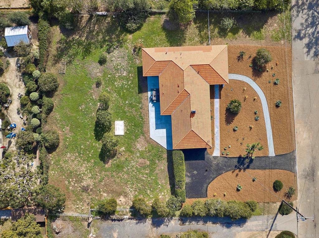 341 Cole Ranch Road Encinitas, CA 92024 - Photo 8 of 44 an aerial view of a house with swimming pool and large trees