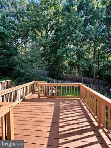 a view of balcony with deck and garden