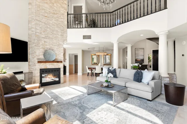 a large kitchen with a table and chairs