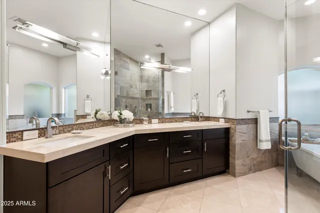 a view of a hallway with wooden floor and a way to couch