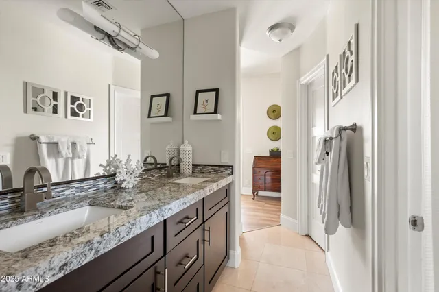 a front view of a house with swimming pool having outdoor seating