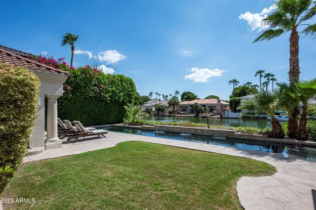 an aerial view of a city with ocean view