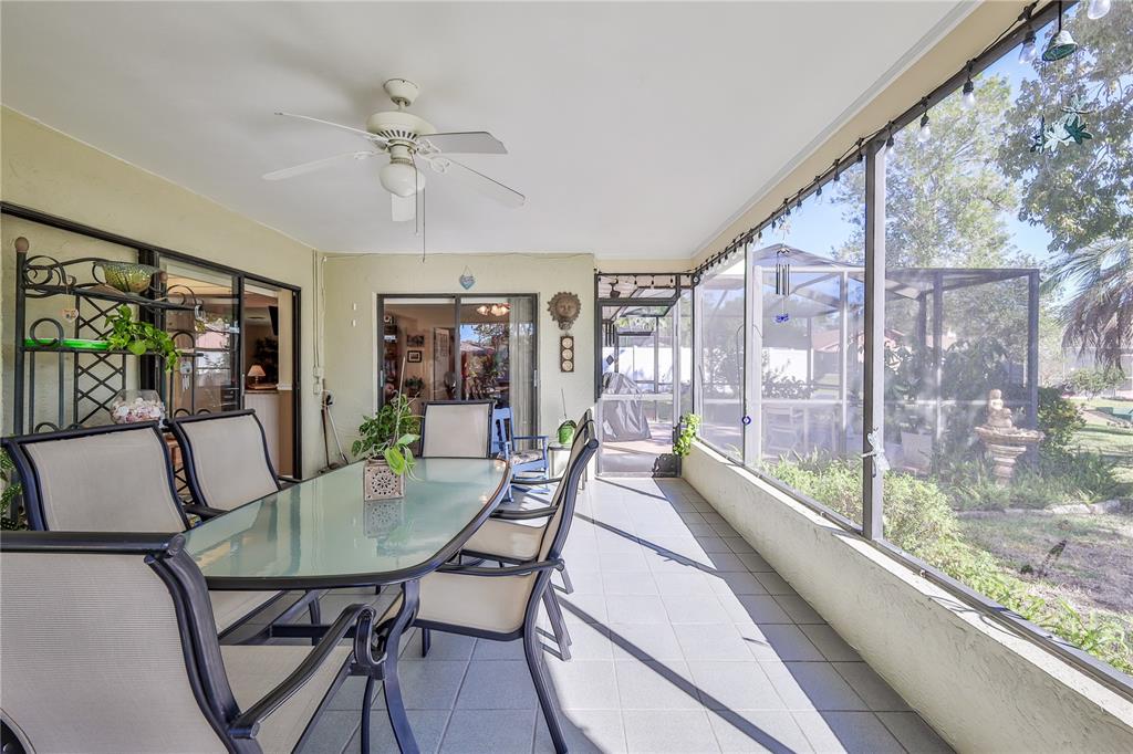 11249 Riddle Drive Spring Hill, FL 34609 - Photo 36 of 43 a view of a dining room with furniture window and outside view