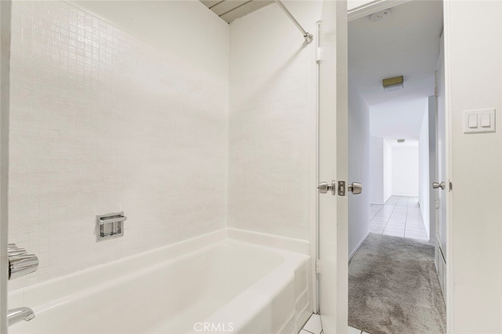 10412 Reseda Boulevard Porter Ranch, CA 91326 - Photo 15 of 38 a bathroom with a tub