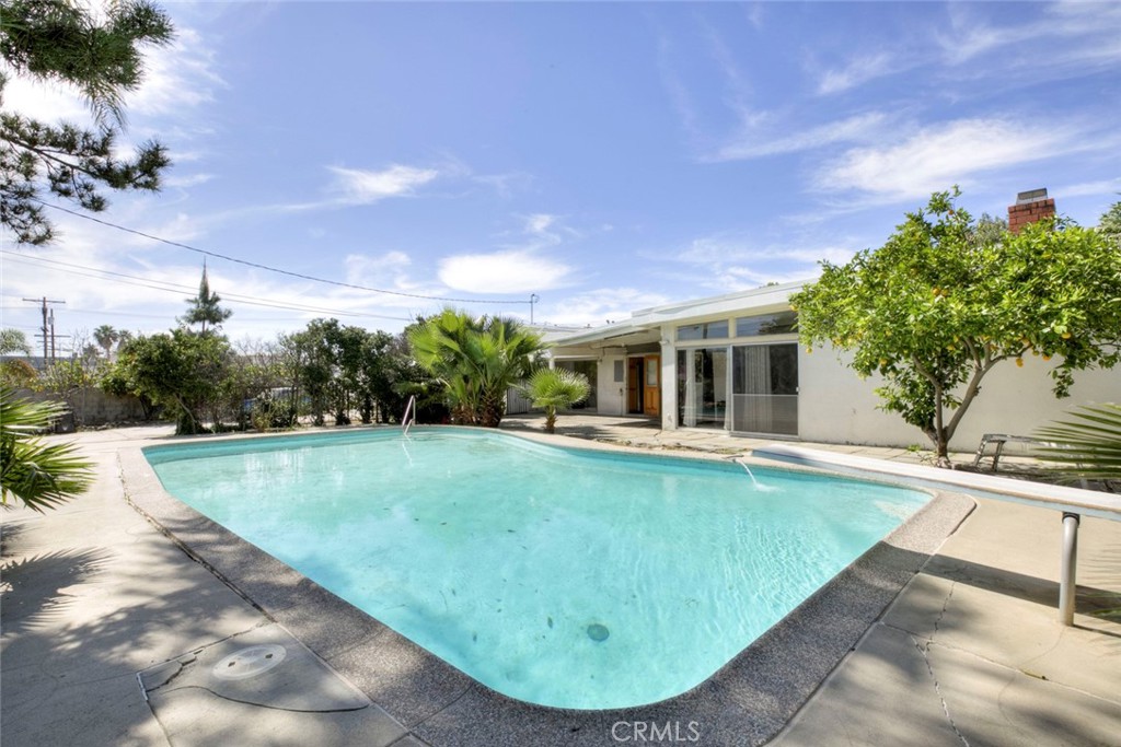 10412 Reseda Boulevard Porter Ranch, CA 91326 - Photo 21 of 38 a view of a house with swimming pool and sitting area