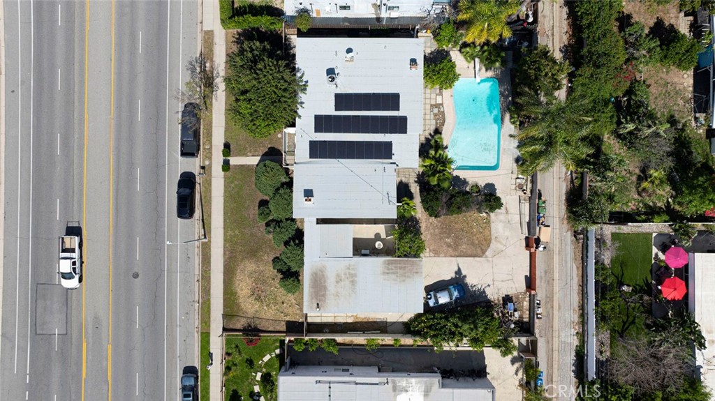 10412 Reseda Boulevard Porter Ranch, CA 91326 - Photo 26 of 38 an aerial view of a house with a yard and garden