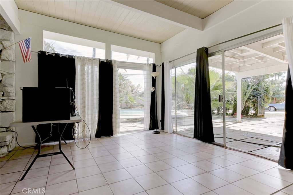 10412 Reseda Boulevard Porter Ranch, CA 91326 - Photo 7 of 38 a view of a room with furniture and large windows