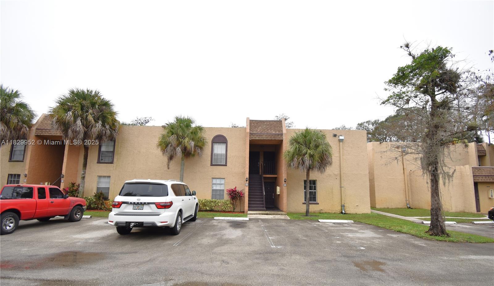 4231 Northwest 19th Street, Unit 256 Lauderhill, FL 33313 - Photo 1 of 16 a house with a outdoor space