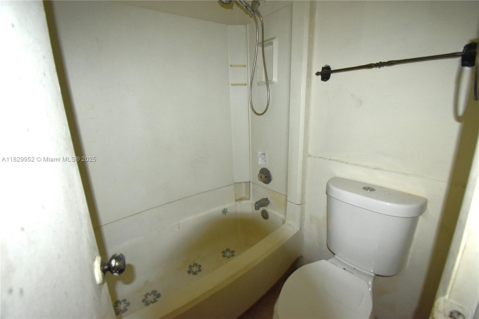 4231 Northwest 19th Street, Unit 256 Lauderhill, FL 33313 - Photo 14 of 16 a bathroom with a toilet and a shower