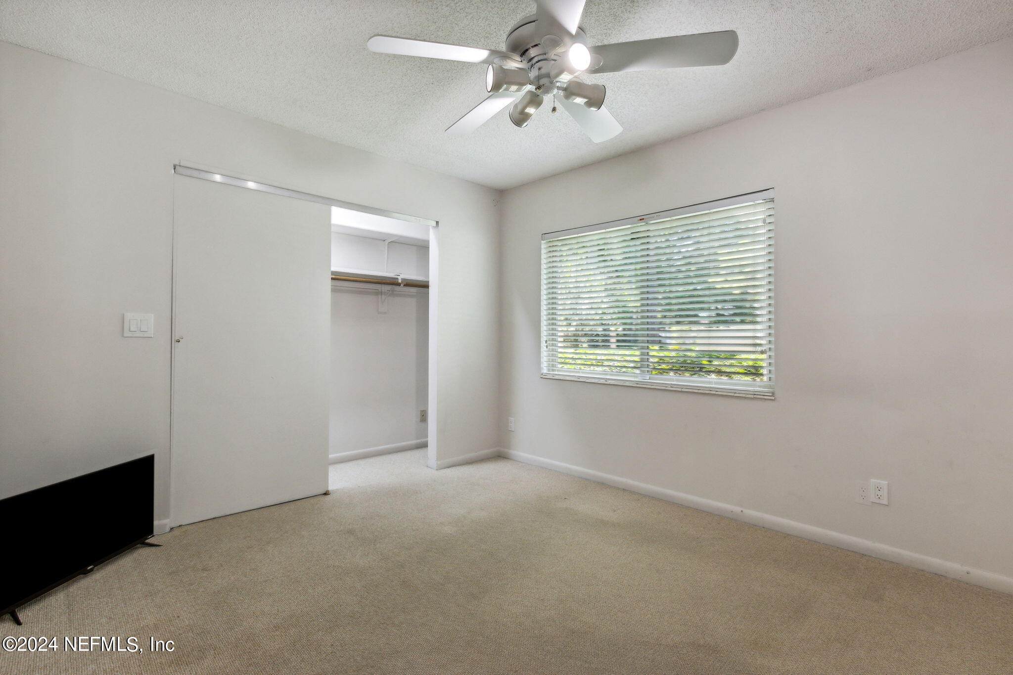 1213 The Grove Road Orange Park, FL 32073 - Photo 21 of 40 a view of an empty room with a window
