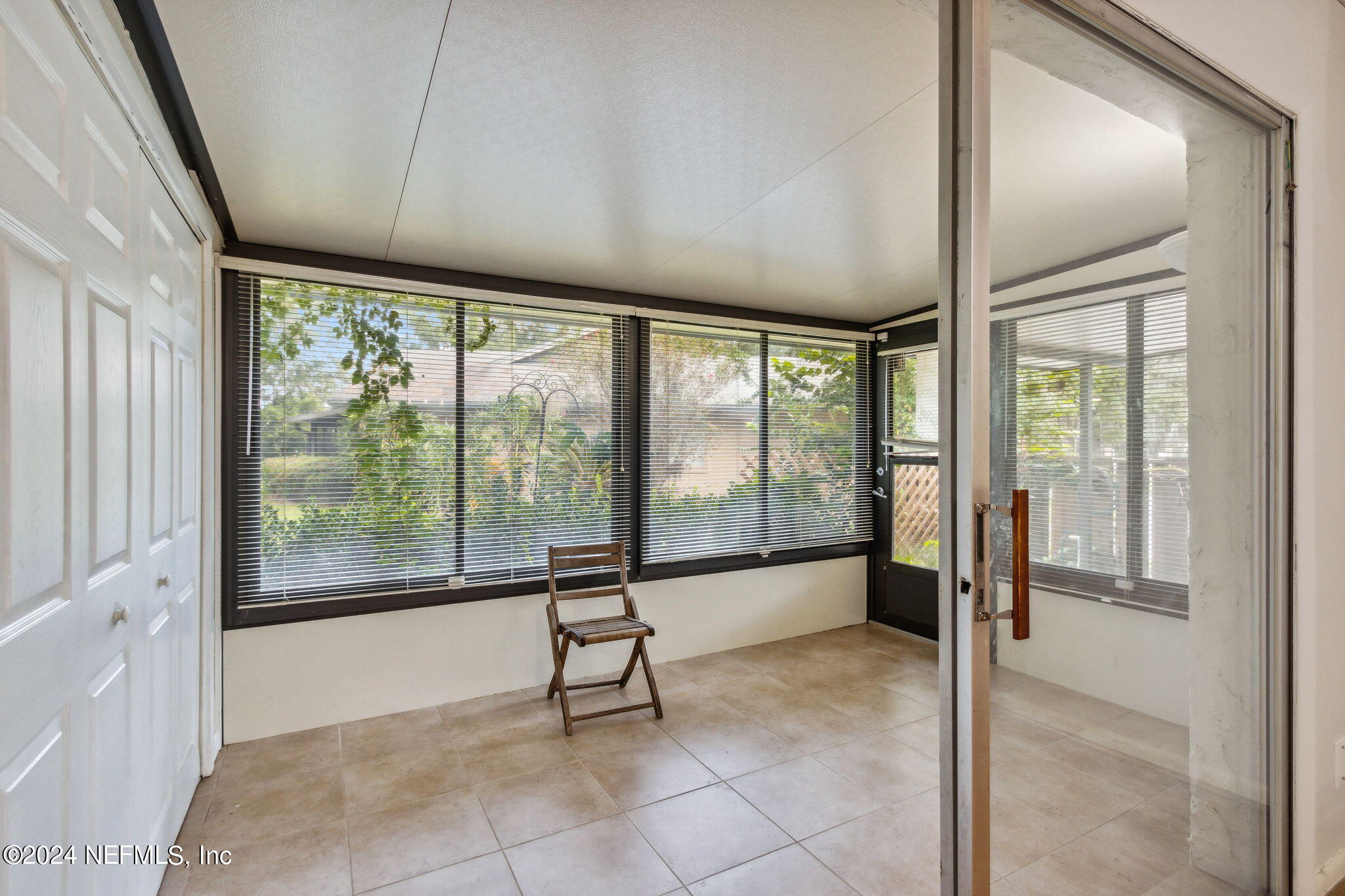 1213 The Grove Road Orange Park, FL 32073 - Photo 30 of 40 a view of an empty room with windows