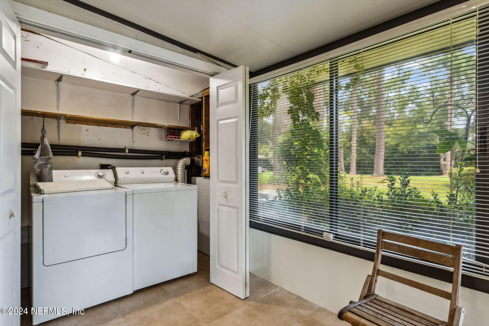 1213 The Grove Road Orange Park, FL 32073 - Photo 31 of 40 a view of a room with washer and dryer