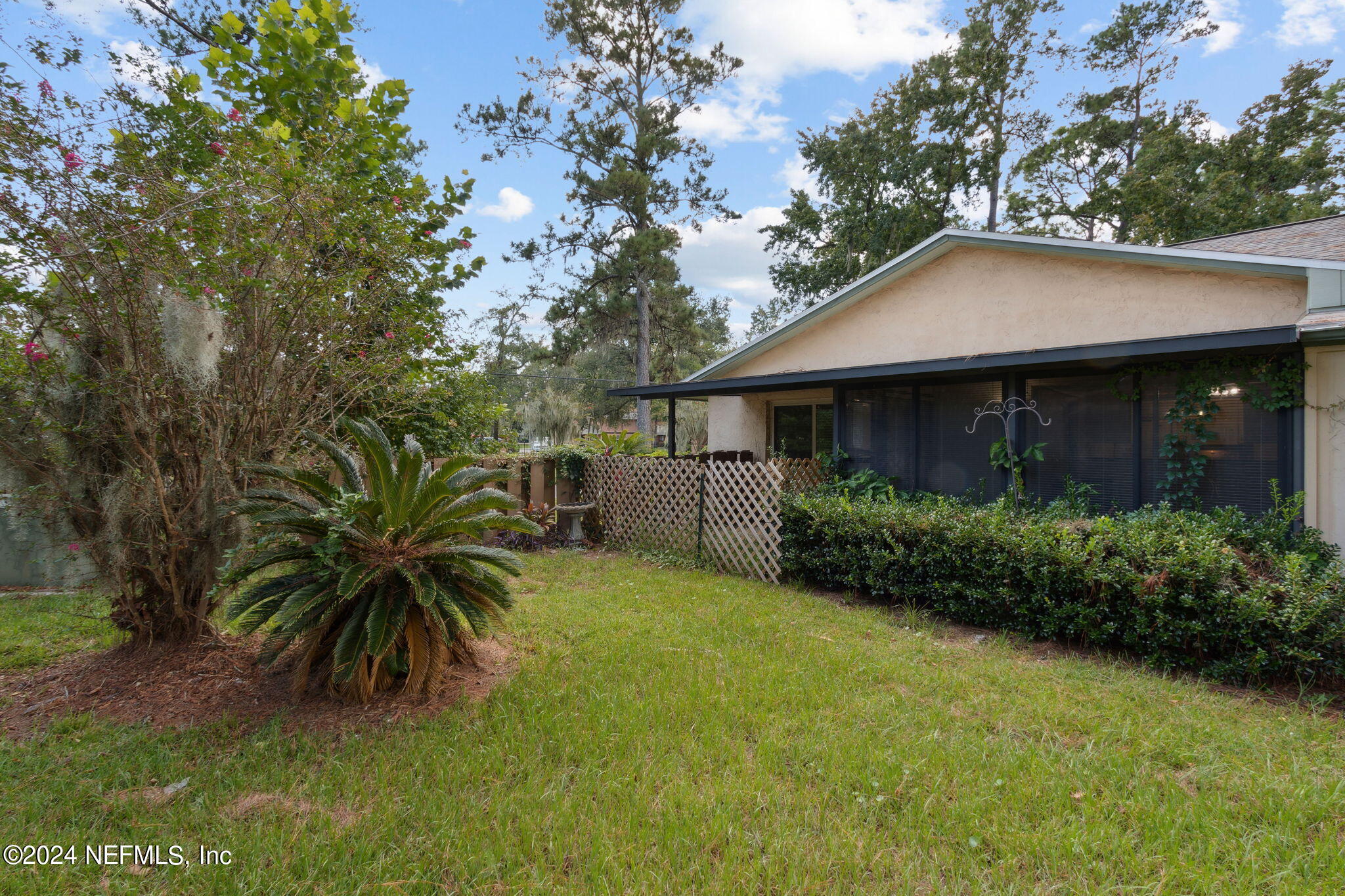 1213 The Grove Road Orange Park, FL 32073 - Photo 33 of 40 a house that has a tree in front of it