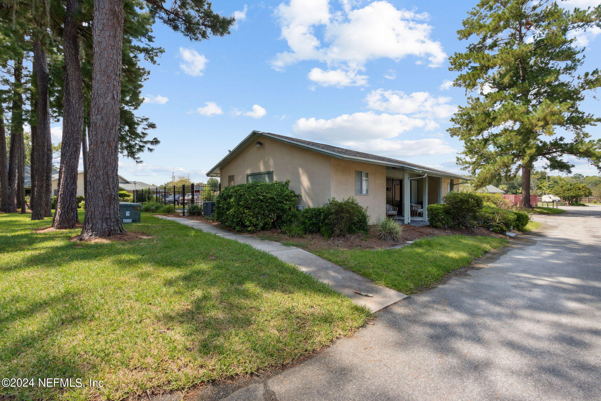 1213 The Grove Road Orange Park, FL 32073 - Photo 38 of 40 a view of a house with backyard and garden