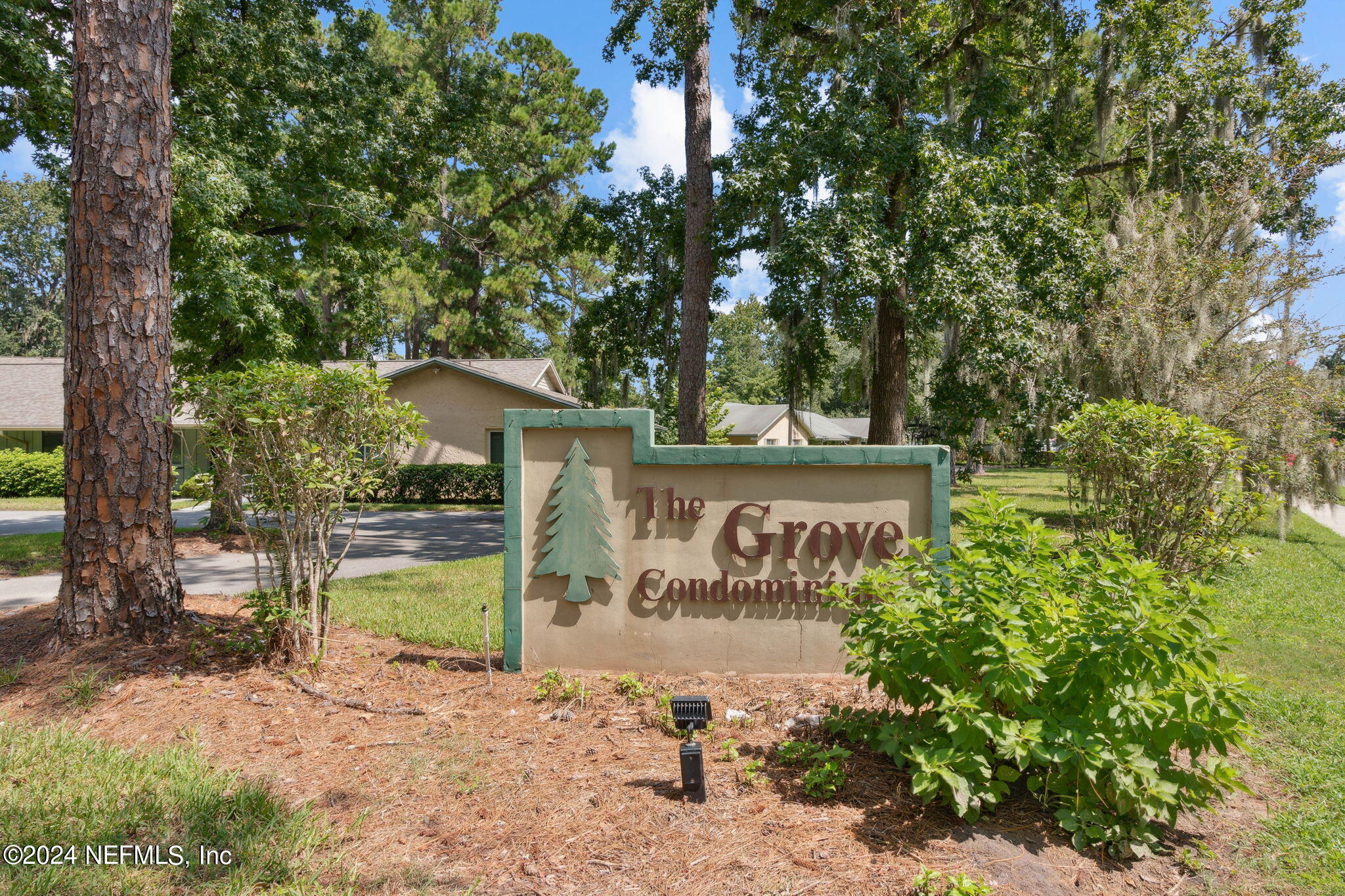1213 The Grove Road Orange Park, FL 32073 - Photo 40 of 40 a sign on the side of a building