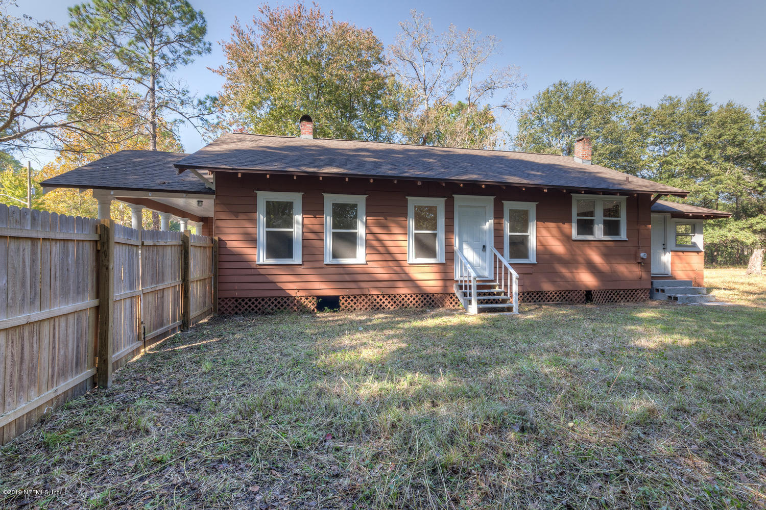 9301 Joos Road Jacksonville, FL 32220 - Photo 5 of 37 a view of a house with a yard