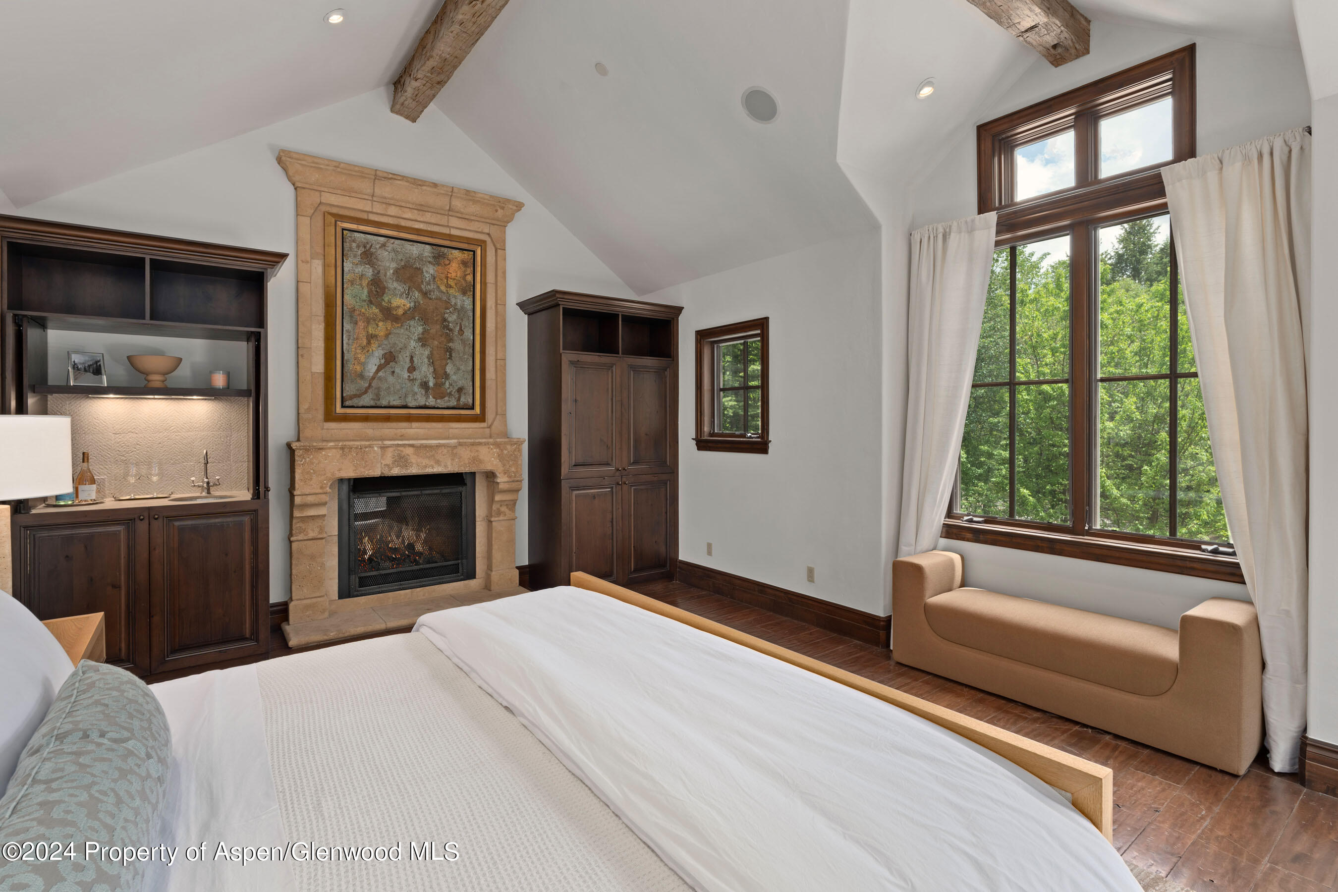 189 McSkimming Road Aspen, CO 81611 - Photo 11 of 37 Primary Bedroom with Fireplace
