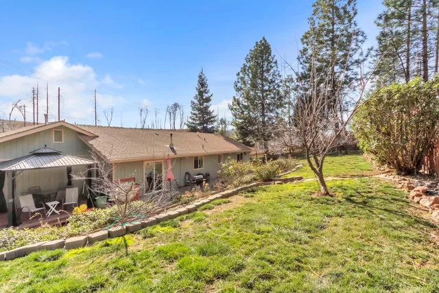 a view of outdoor sitting area with furniture and wooden deck