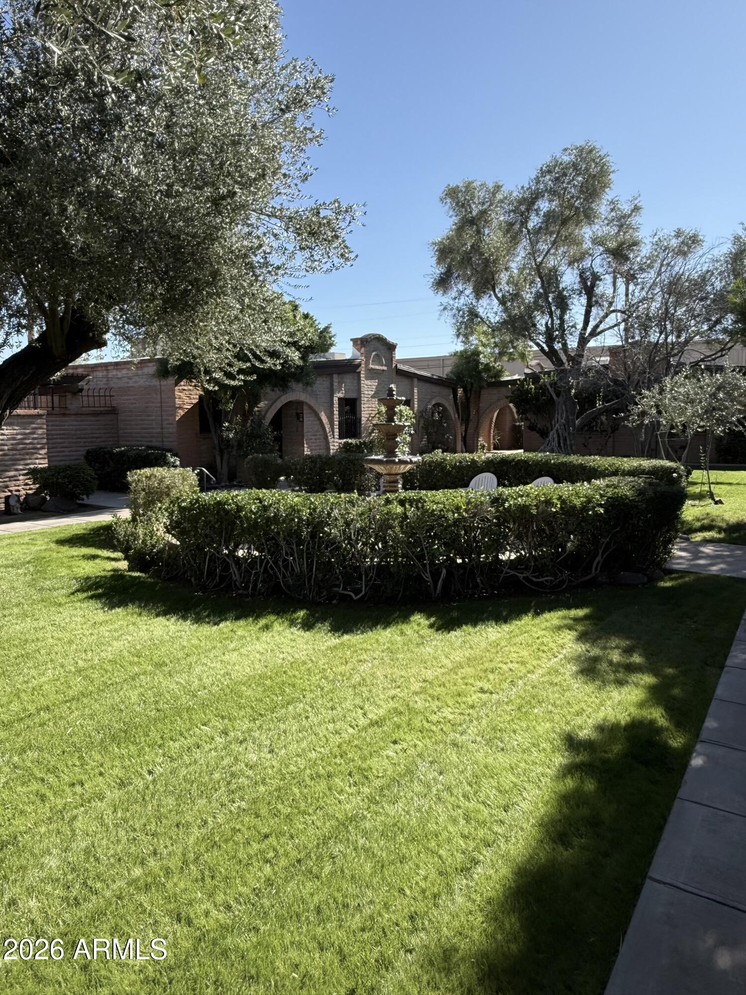 3032 North 32nd Street, Unit 65 Phoenix, AZ 85018 - Photo 18 of 22 a view of a garden