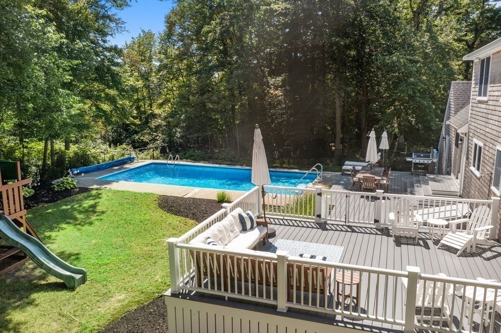 14 Sassamon Road Scituate, MA 02066 - Photo 20 of 28 a view of a house with swimming pool