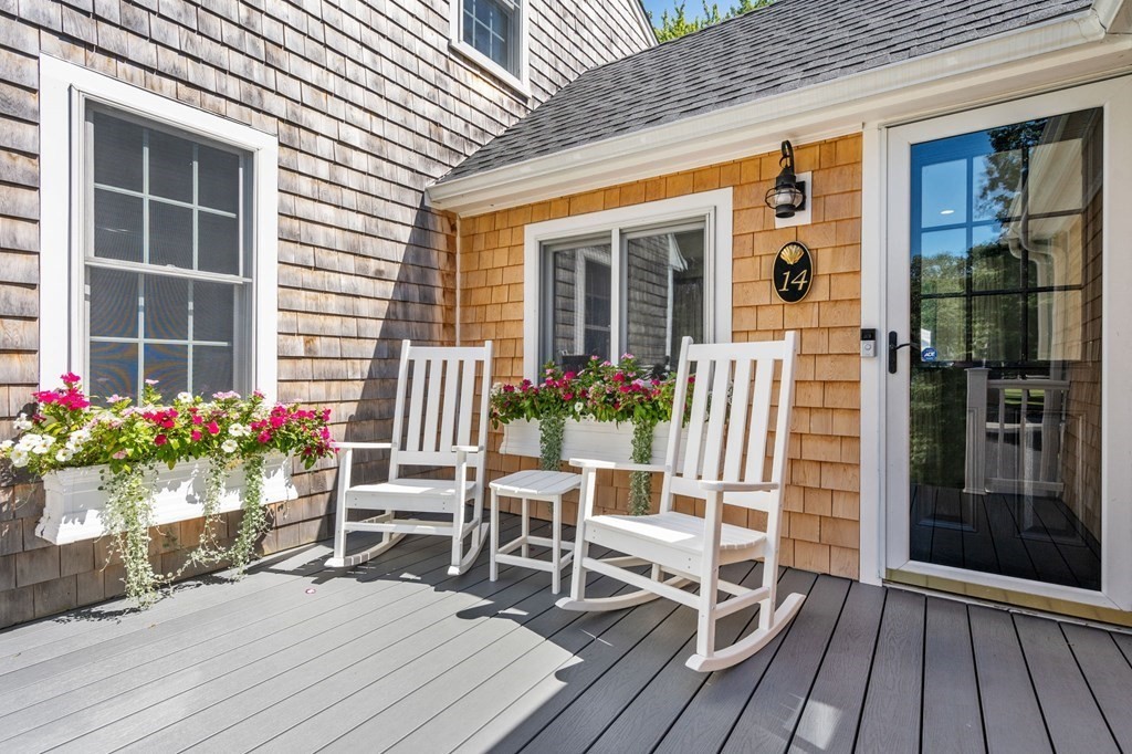 14 Sassamon Road Scituate, MA 02066 - Photo 2 of 28 a house view with a seating space and garden space