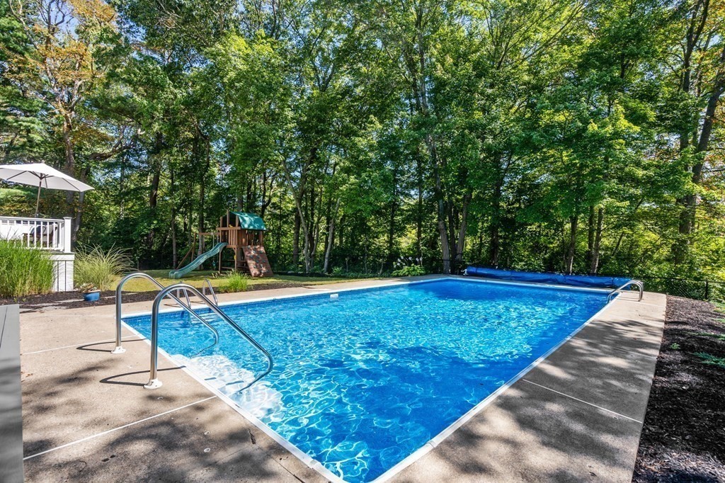 14 Sassamon Road Scituate, MA 02066 - Photo 24 of 28 a view of a backyard with swimming pool