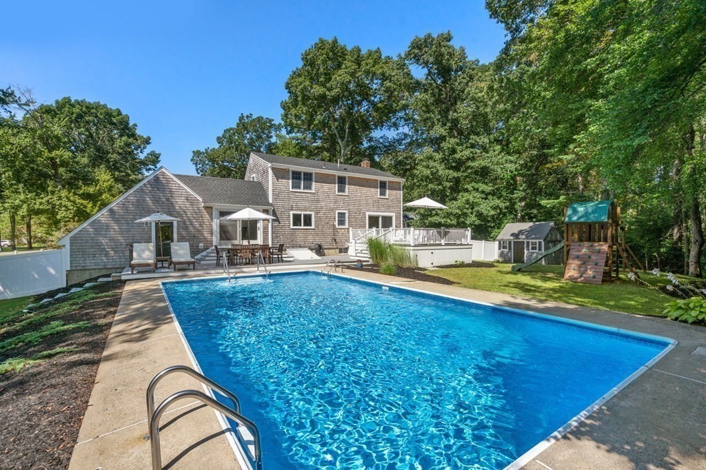 14 Sassamon Road Scituate, MA 02066 - Photo 25 of 28 a view of house with swimming pool outdoor seating