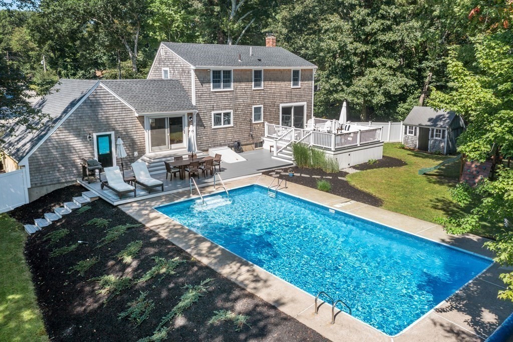14 Sassamon Road Scituate, MA 02066 - Photo 26 of 28 a front view of a house with garden