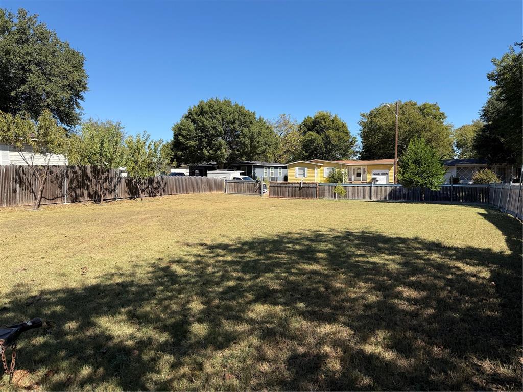5127 Cardiff Street Dallas, TX 75241 - Photo 11 of 11 a view of a swimming pool with an outdoor space and seating area