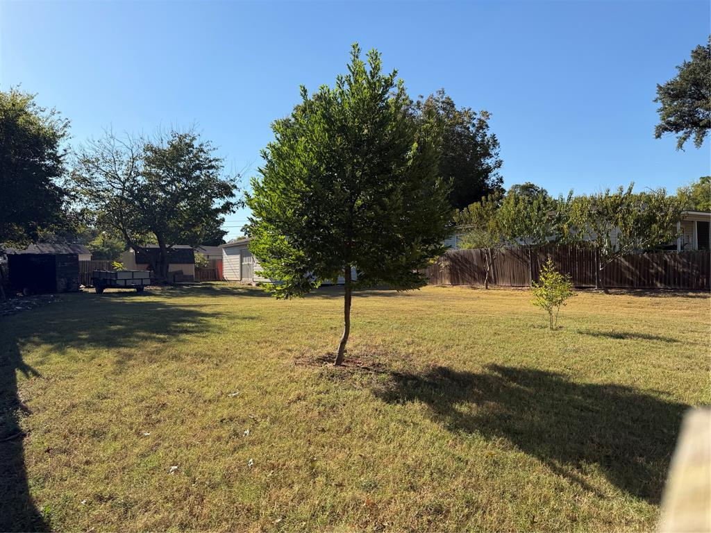 5127 Cardiff Street Dallas, TX 75241 - Photo 2 of 11 a view of a yard with swimming pool