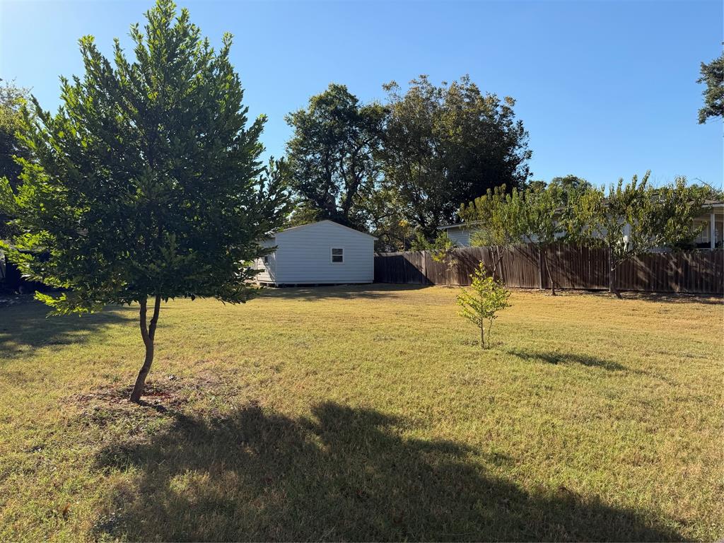 5127 Cardiff Street Dallas, TX 75241 - Photo 4 of 11 a view of back yard of the house