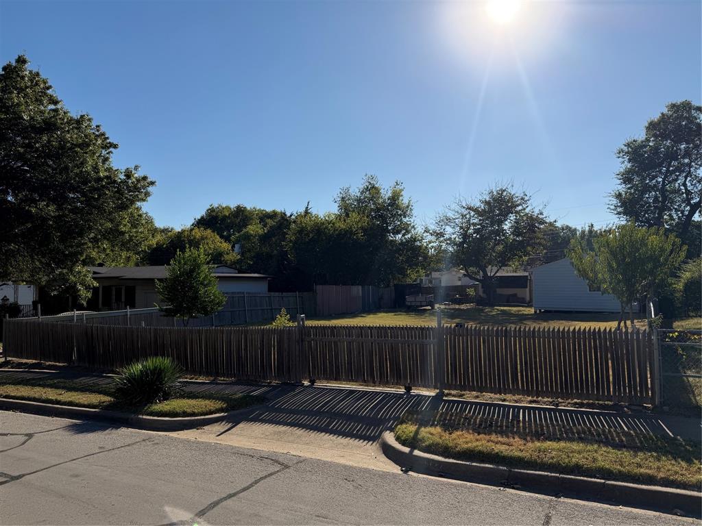 5127 Cardiff Street Dallas, TX 75241 - Photo 5 of 11 a view of a deck with furniture and wooden fence