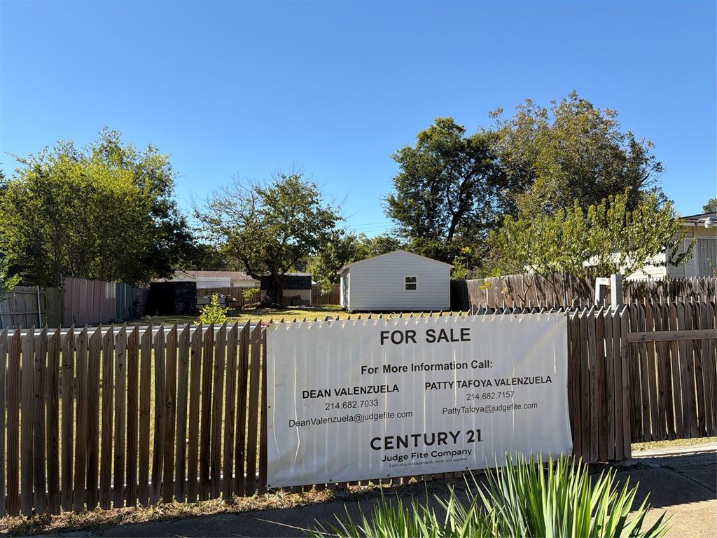 5127 Cardiff Street Dallas, TX 75241 - Photo 8 of 11 a sign on the side of a building