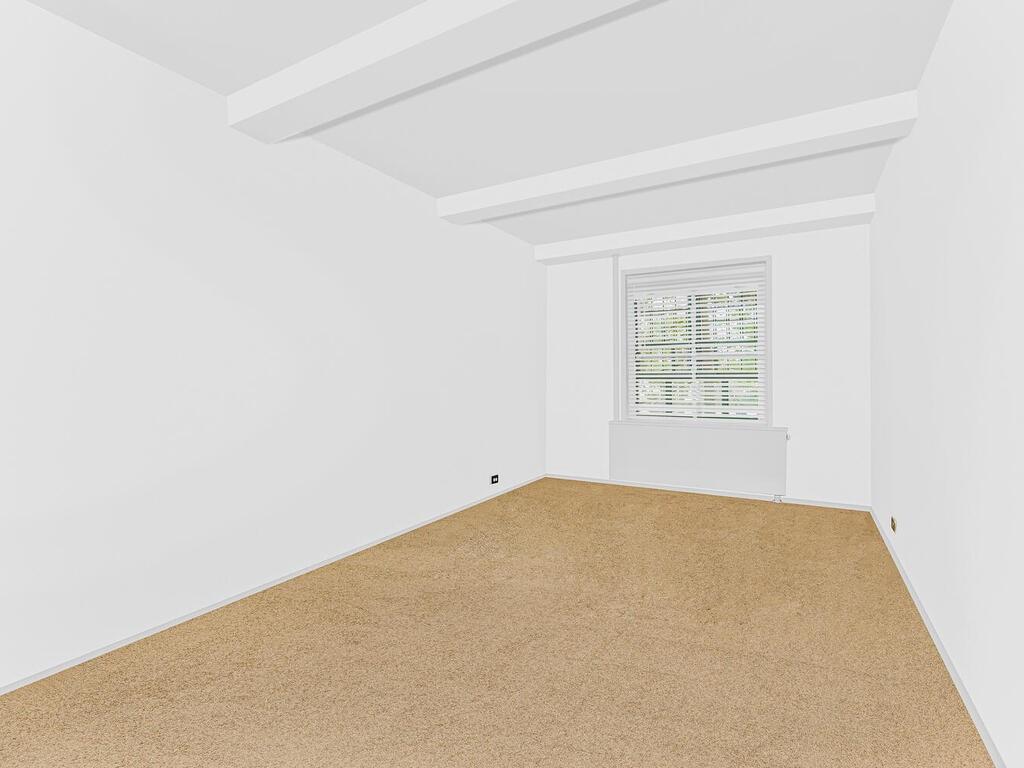 1510 Archer Road, Unit MF Bronx, NY 10462 - Photo 8 of 10 an empty room with windows
