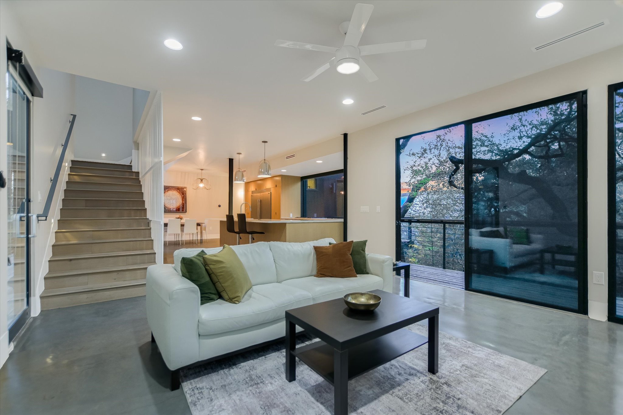 1325 Bonham Terrace, Unit A Austin, TX 78704 - Photo 9 of 25 a living room with furniture and a large window