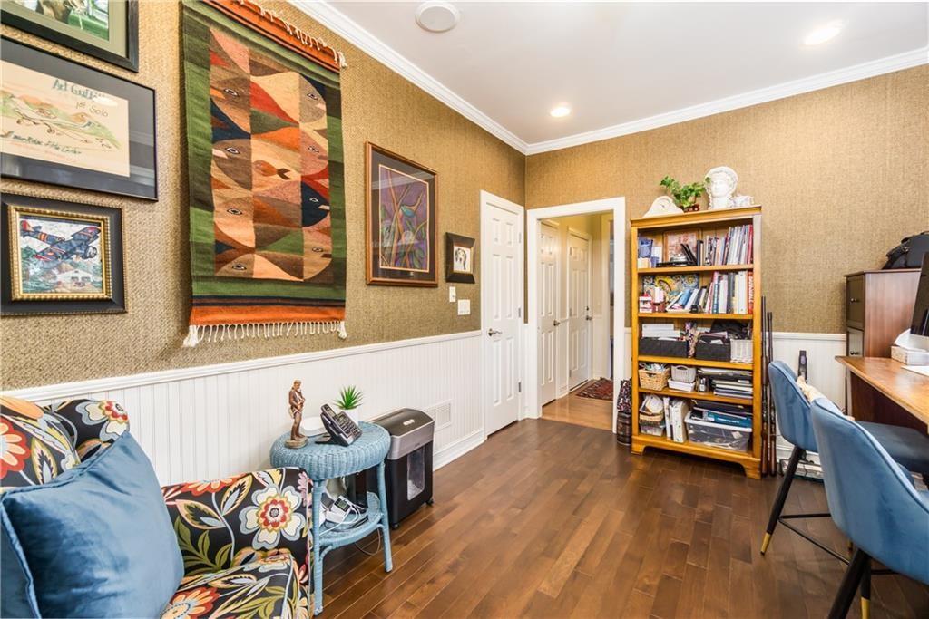 2819 Point Overlook Gainesville, GA 30501 - Photo 21 of 71 a living room with furniture and a wooden floor