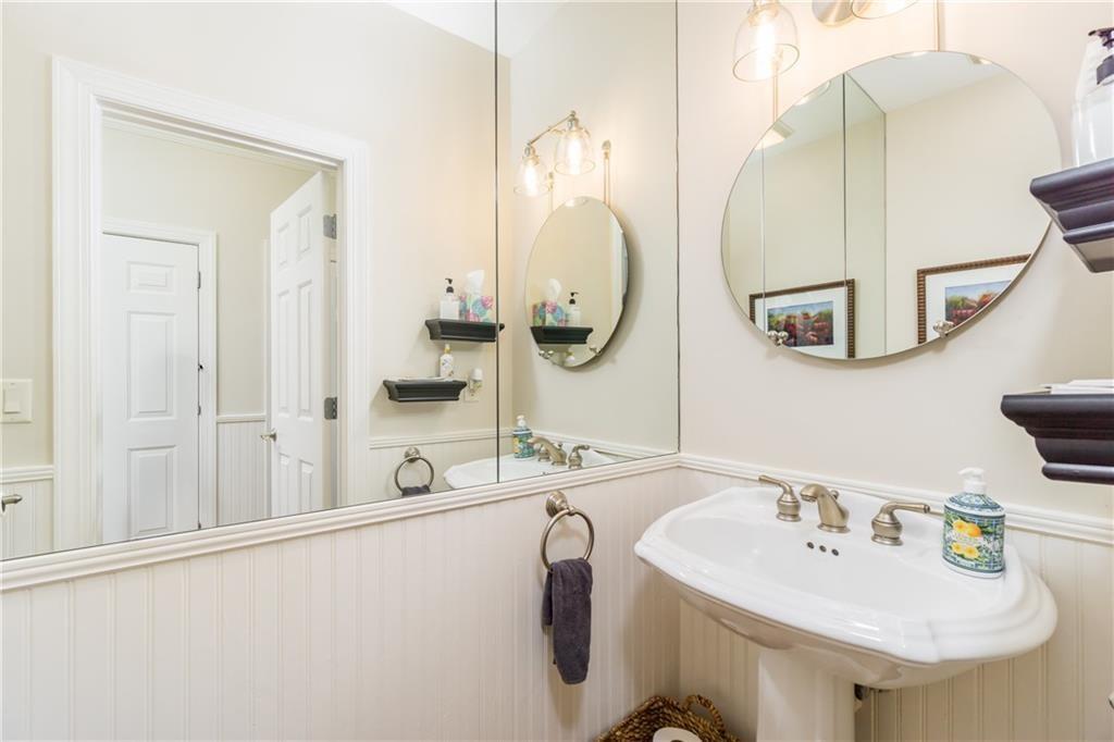 2819 Point Overlook Gainesville, GA 30501 - Photo 28 of 71 a bathroom with a sink and a mirror