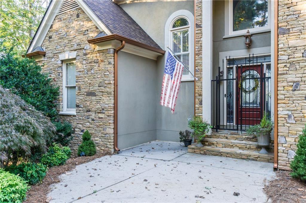 2819 Point Overlook Gainesville, GA 30501 - Photo 4 of 71 a front view of a house with a yard
