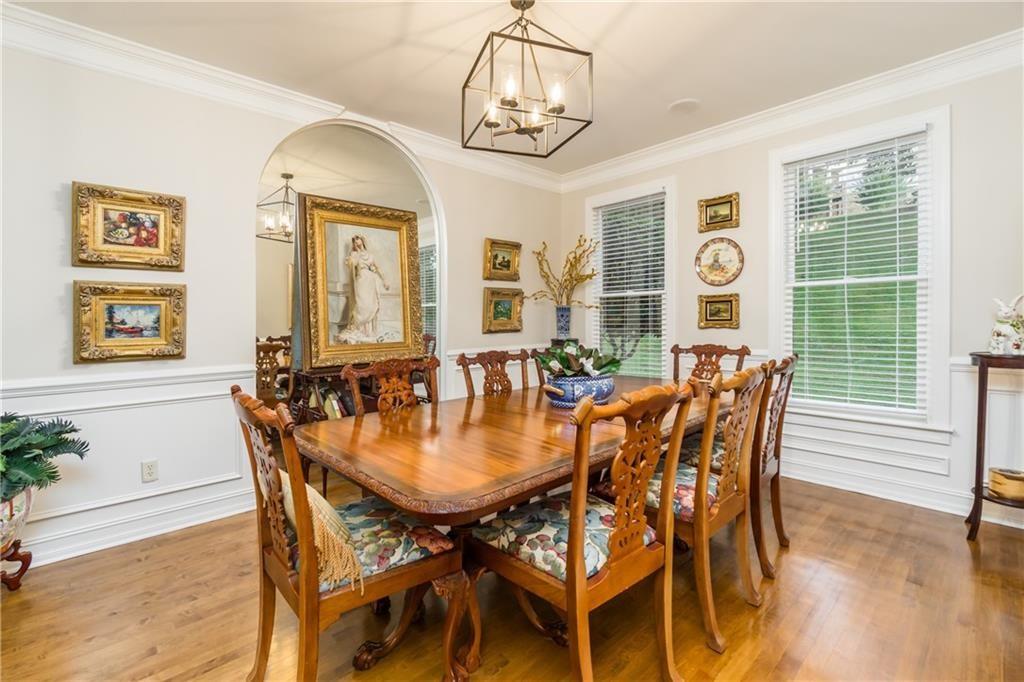 2819 Point Overlook Gainesville, GA 30501 - Photo 8 of 71 a view of a dining room with furniture window and wooden floor