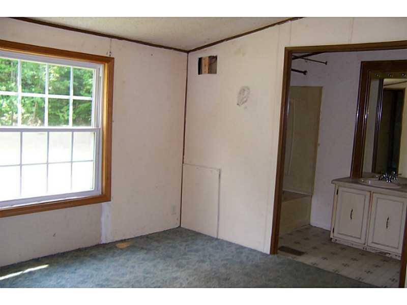 167 Old Town Road Hudson, ME 04449 - Photo 6 of 7 Living Room.