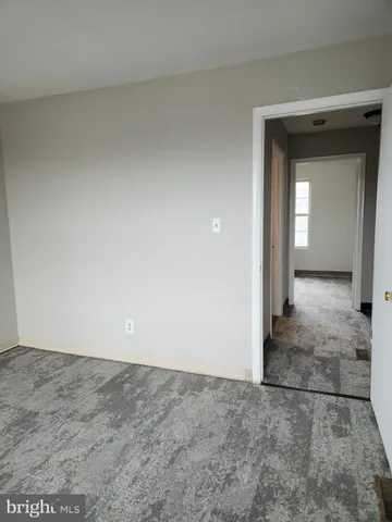 a bathroom with a sink toilet and a mirror