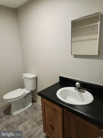 an empty room with a bench