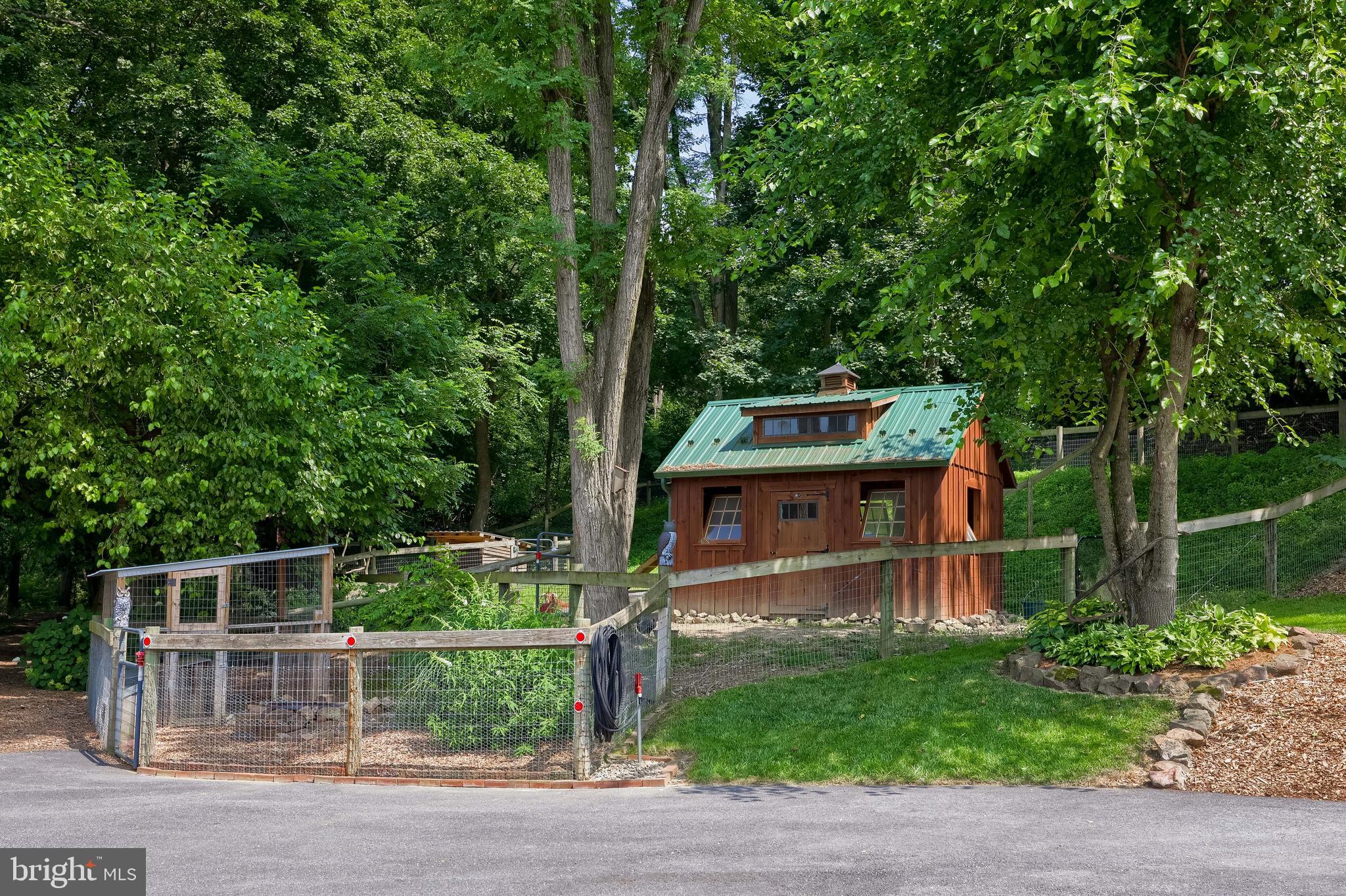335 North Clay Road Lititz, PA 17543 - Photo 14 of 150 a front view of a house with a garden
