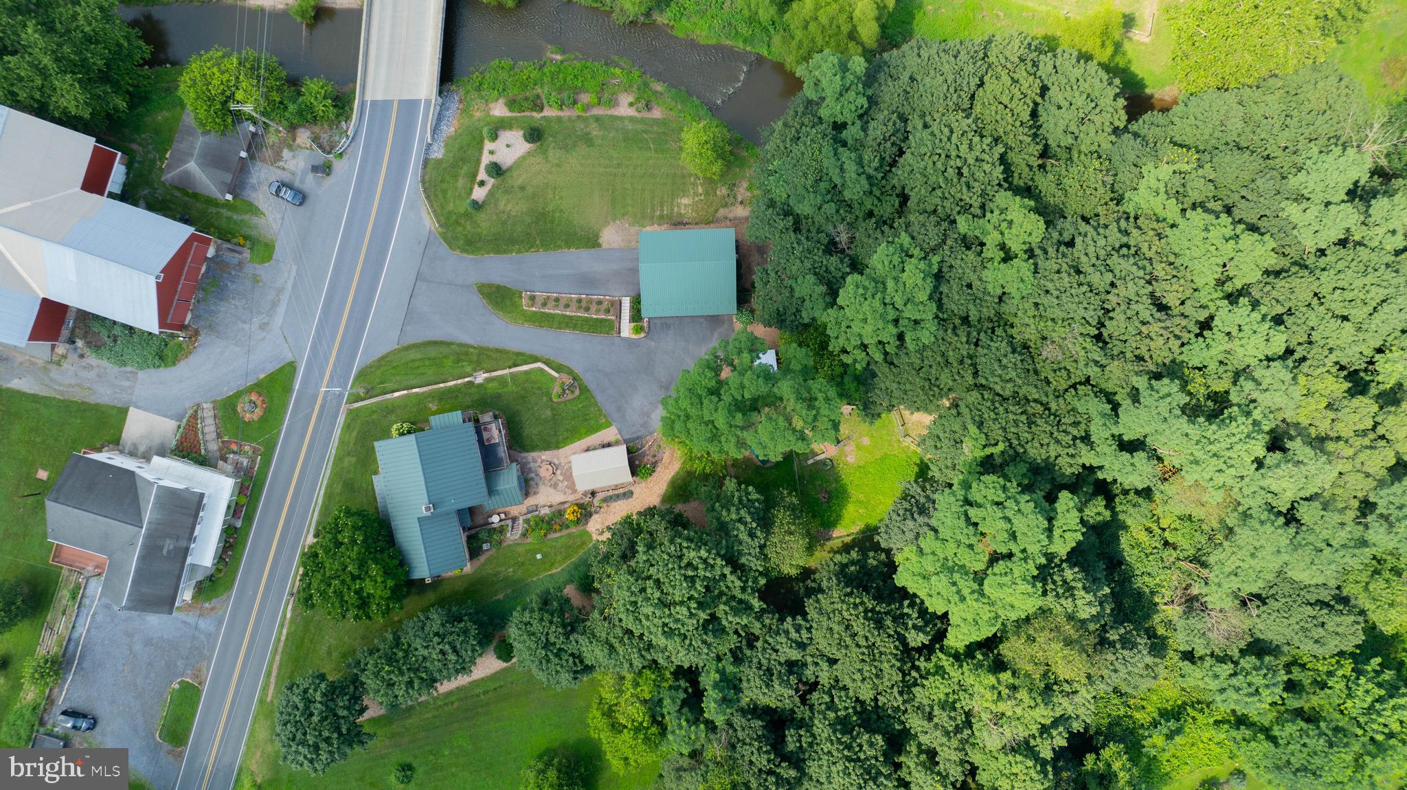 335 North Clay Road Lititz, PA 17543 - Photo 144 of 150 an aerial view of a house with a yard basket ball court and outdoor seating