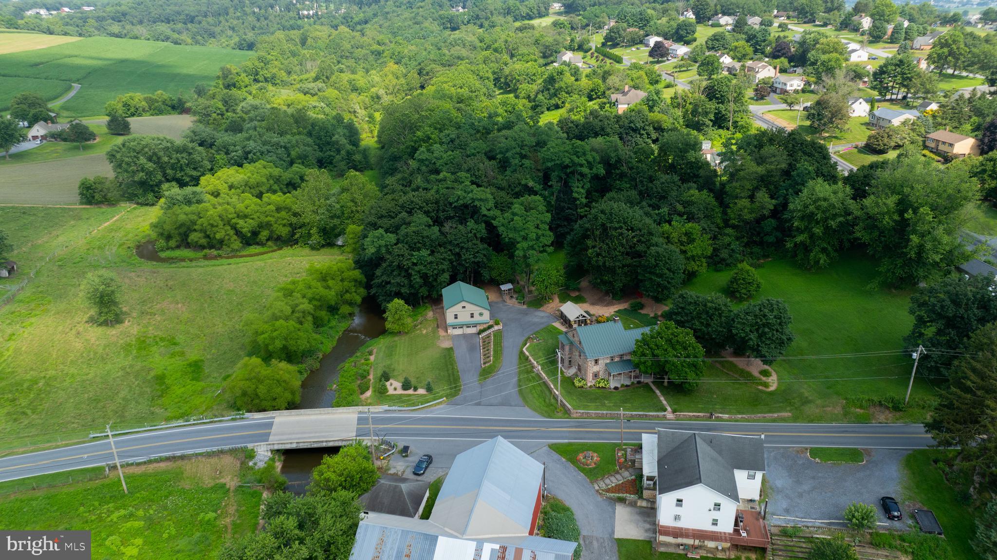 335 North Clay Road Lititz, PA 17543 - Photo 145 of 150 an aerial view of residential house with outdoor space and trees all around