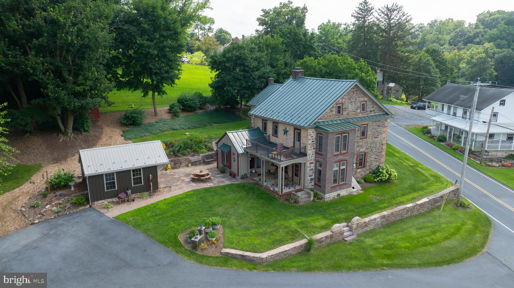 335 North Clay Road Lititz, PA 17543 - Photo 26 of 150 an aerial view of a house with swimming pool garden and patio