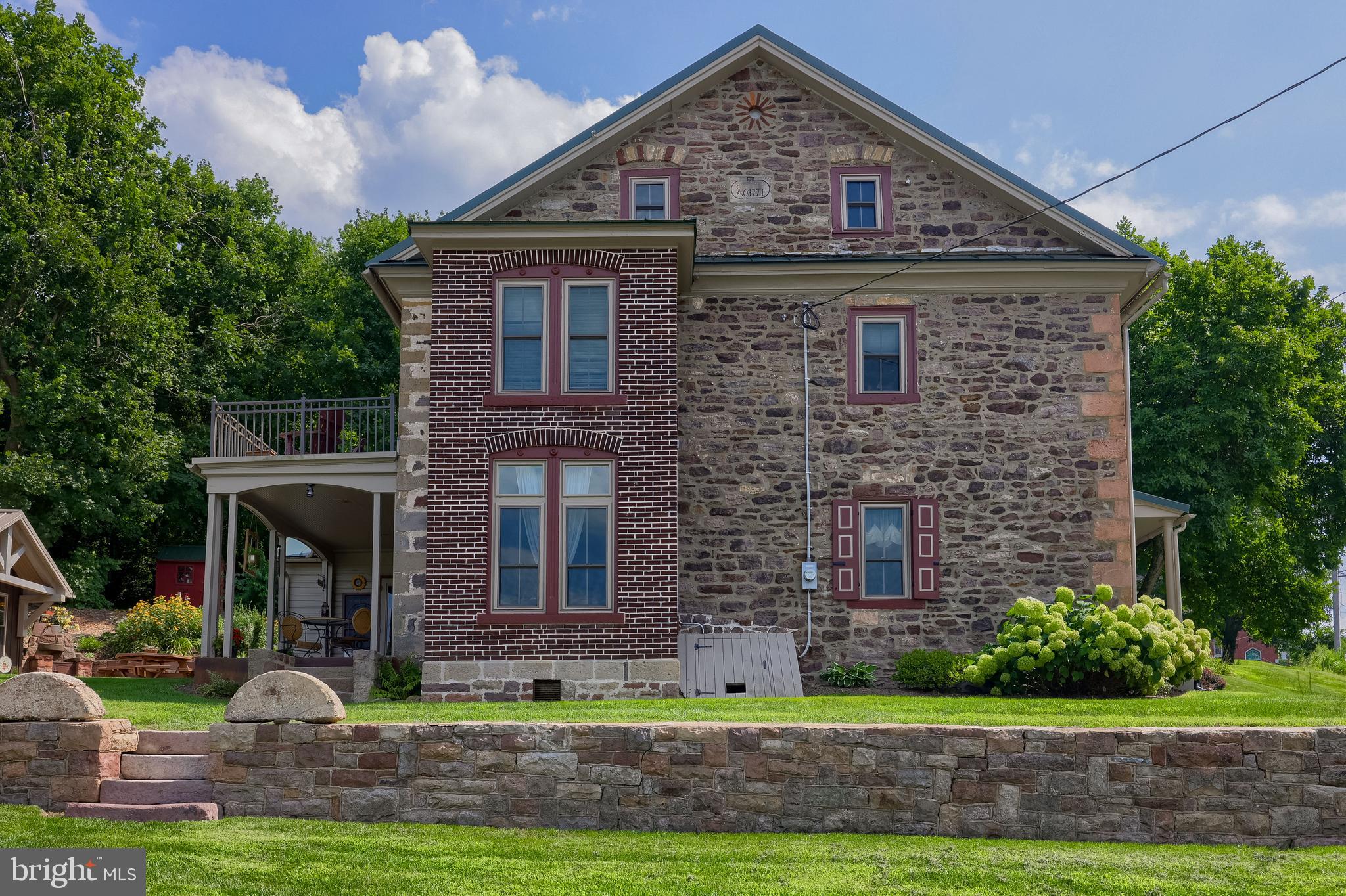 335 North Clay Road Lititz, PA 17543 - Photo 28 of 150 a front view of a house with garden
