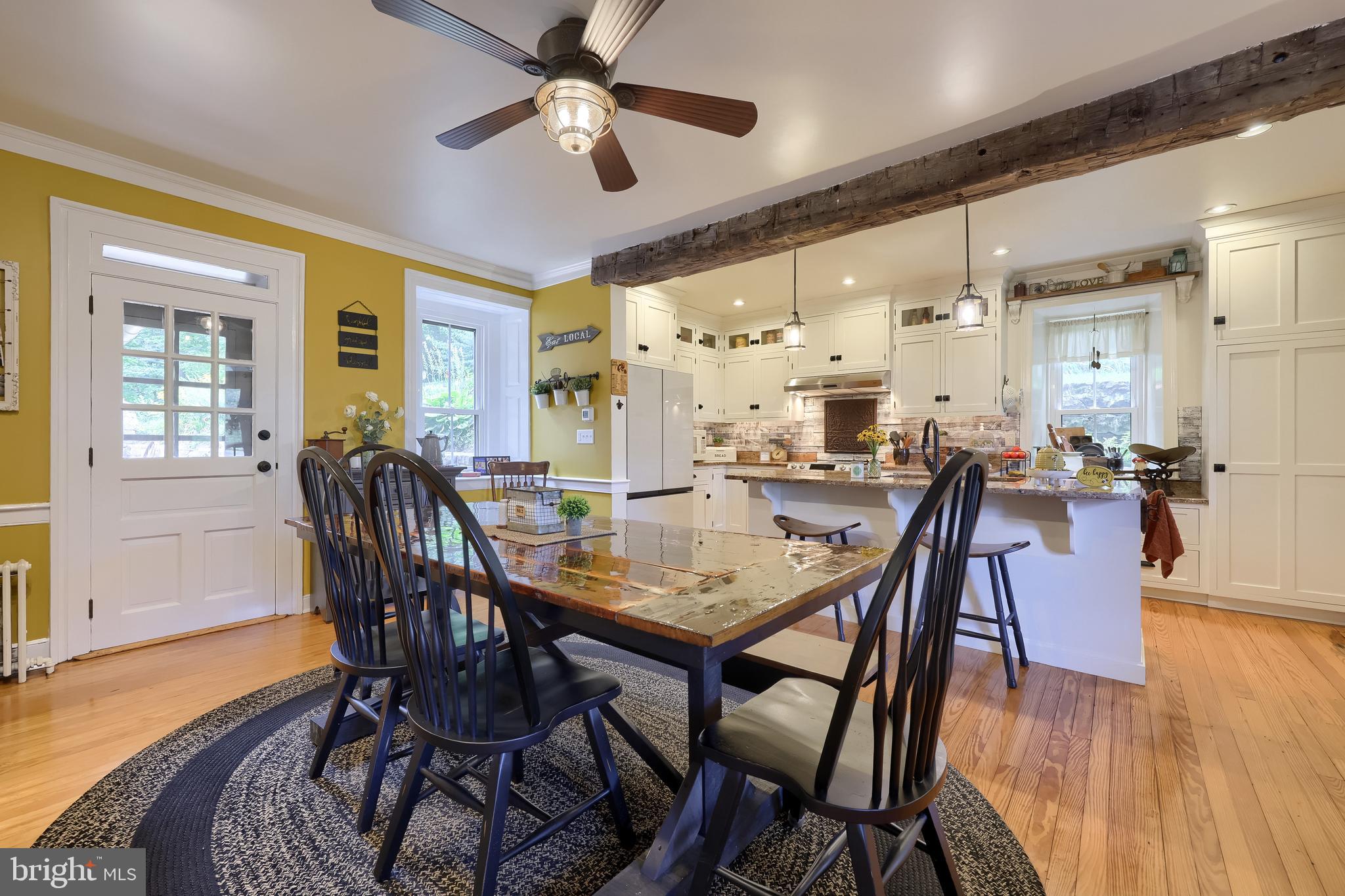 335 North Clay Road Lititz, PA 17543 - Photo 33 of 150 a view of a dining room with furniture and wooden floor