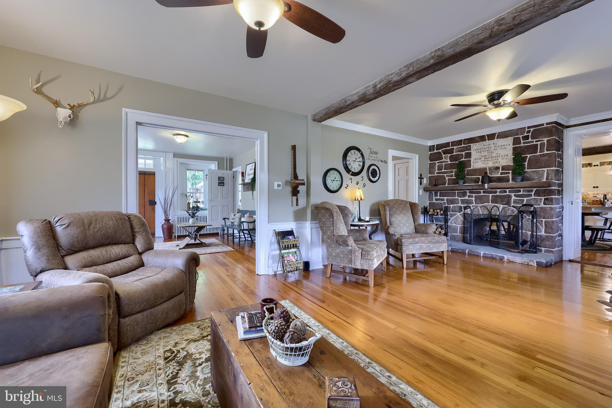 335 North Clay Road Lititz, PA 17543 - Photo 42 of 150 a living room with furniture kitchen view and a chandelier
