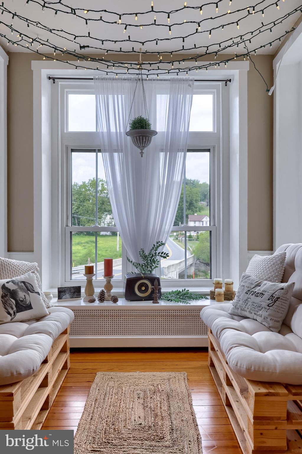 335 North Clay Road Lititz, PA 17543 - Photo 54 of 150 a living room with furniture and a floor to ceiling window